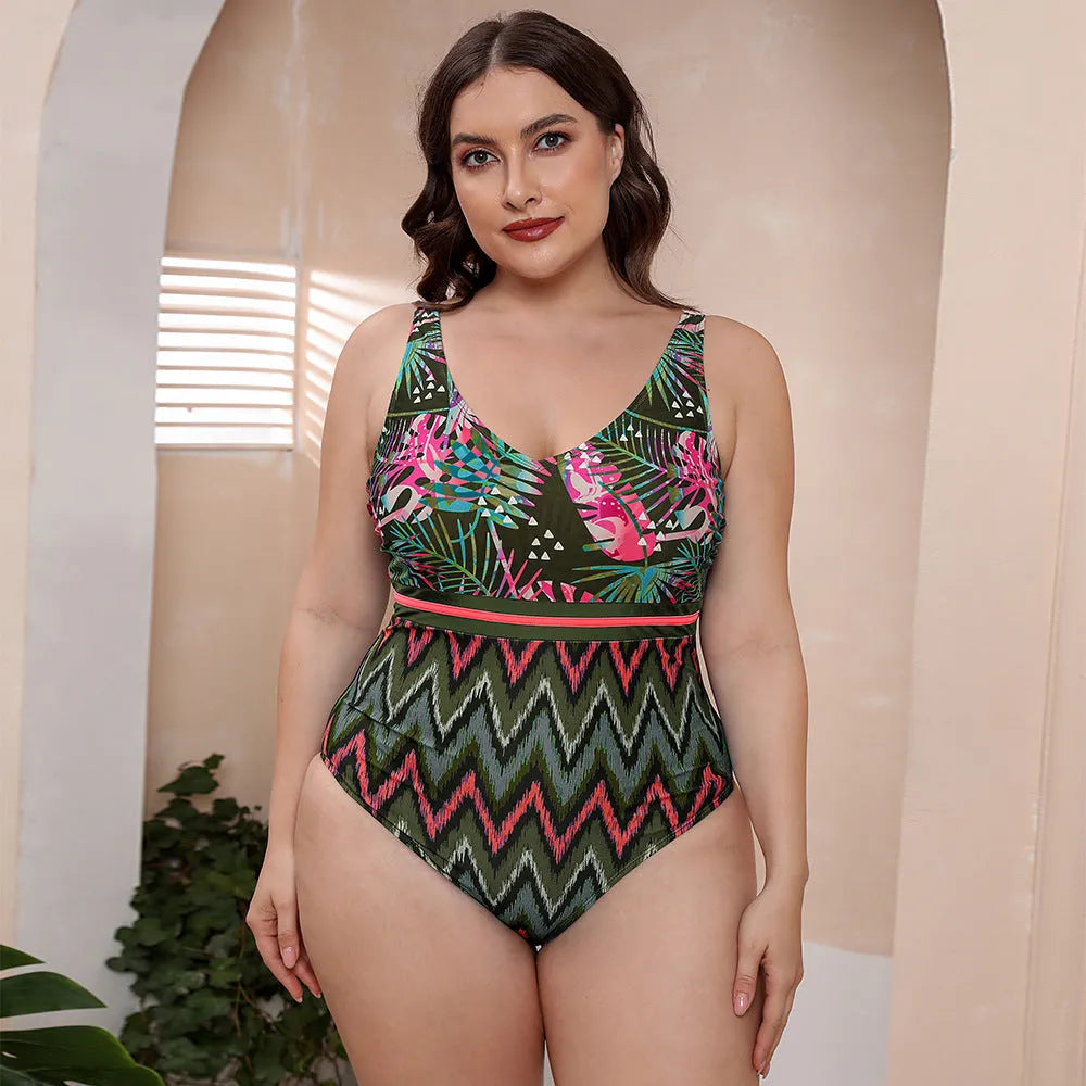 Blue printed spaghetti strap one-piece swimsuit with a striped vest design on a mannequin.