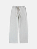 Men's grey fleece-lined sweatpants with elastic drawstring waistband and loose fit design