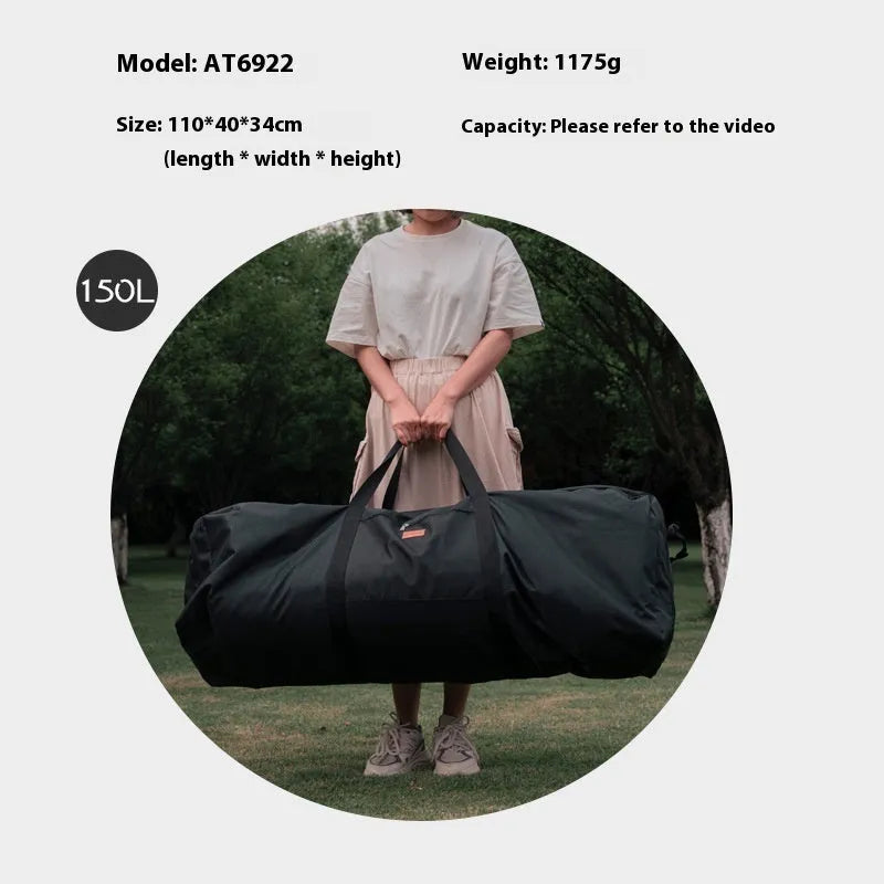 Green waterproof camping storage bag with carry handles, shown carrying a folding table and chairs.