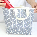 Arrow pattern cosmetic makeup bag with zippered closure and polyester fabric