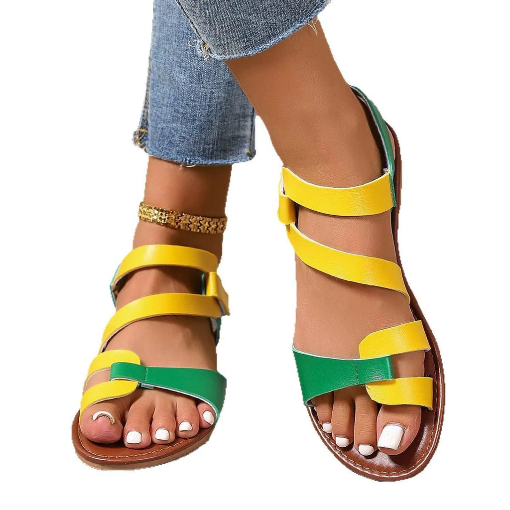 Women's flat sandals with Velcro strap in black, brown and colourful options on rubber sole