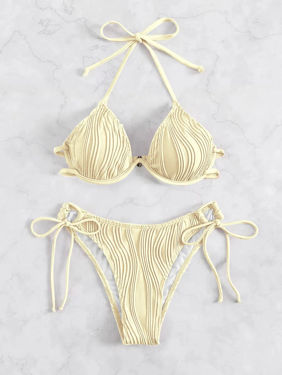 Women's apricot coloured split bikini swimsuit with steel wire bracket support.