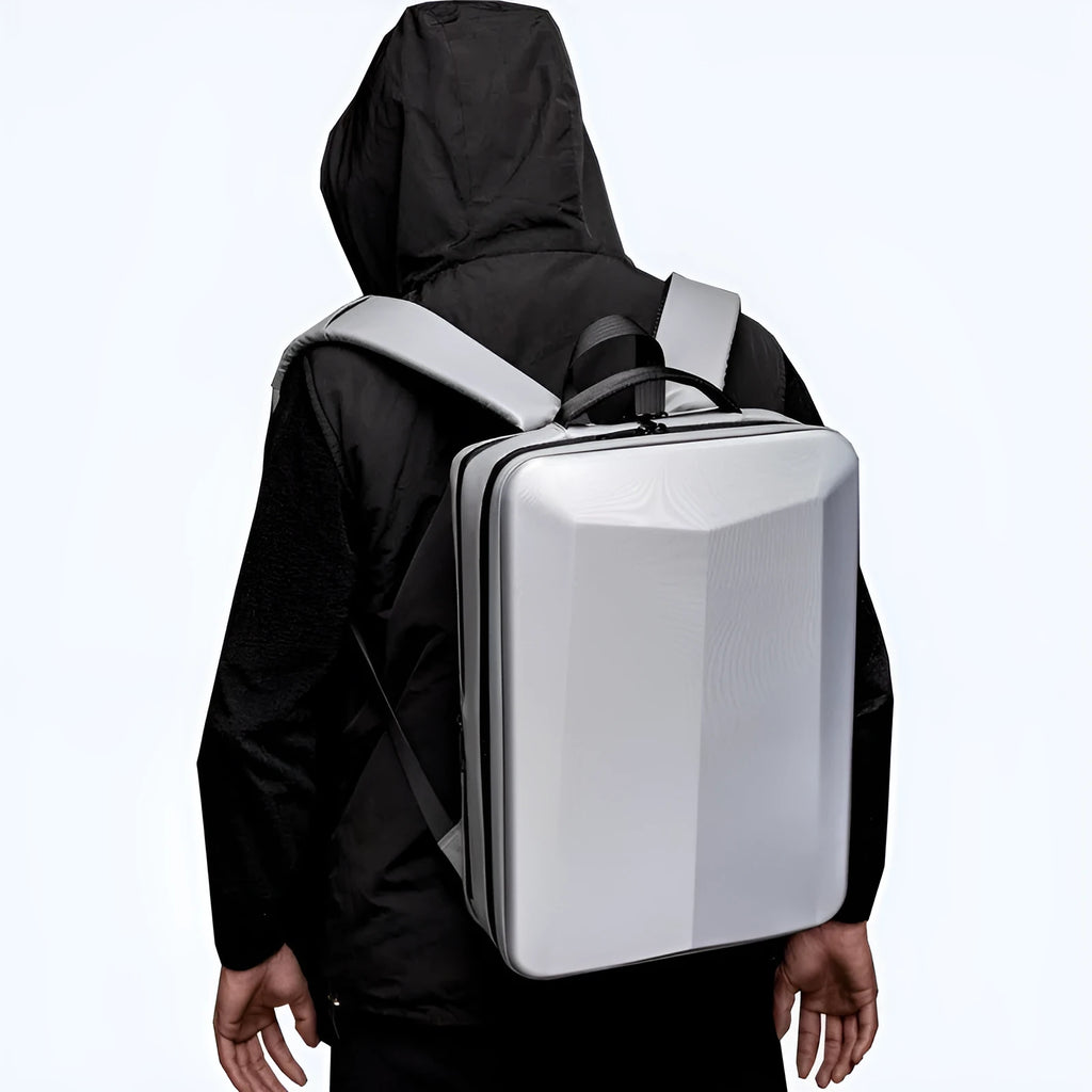Black waterproof business backpack with curved shoulder straps and splicing design elements