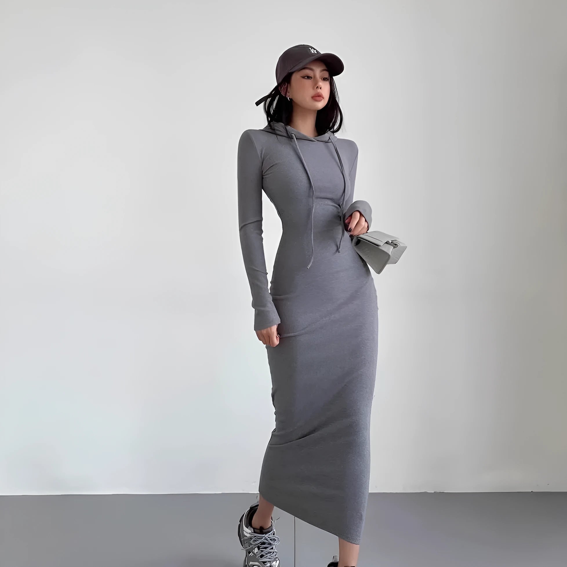 Women's grey hooded sheath dress with long sleeves and high waist, knee-length polyester fabric