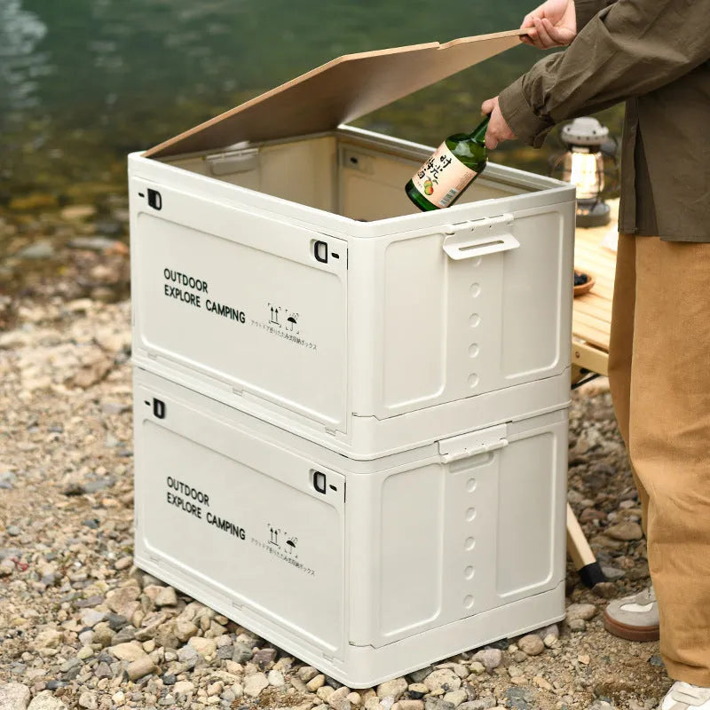 Large white plastic storage box with wooden lid showing foldable sides