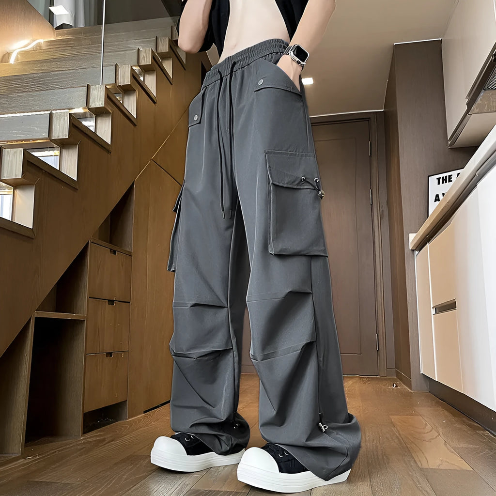 Plus size black straight-leg waterproof trousers with an elastic drawstring waist