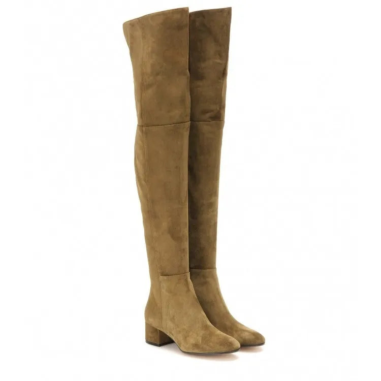 Women's grey suede over the knee flat boots with a pointed toe and low thick rubber sole.