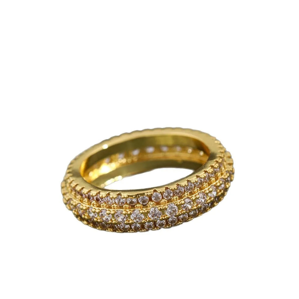 Geometric triangle zircon ring in three colour options showing detailed inlay work