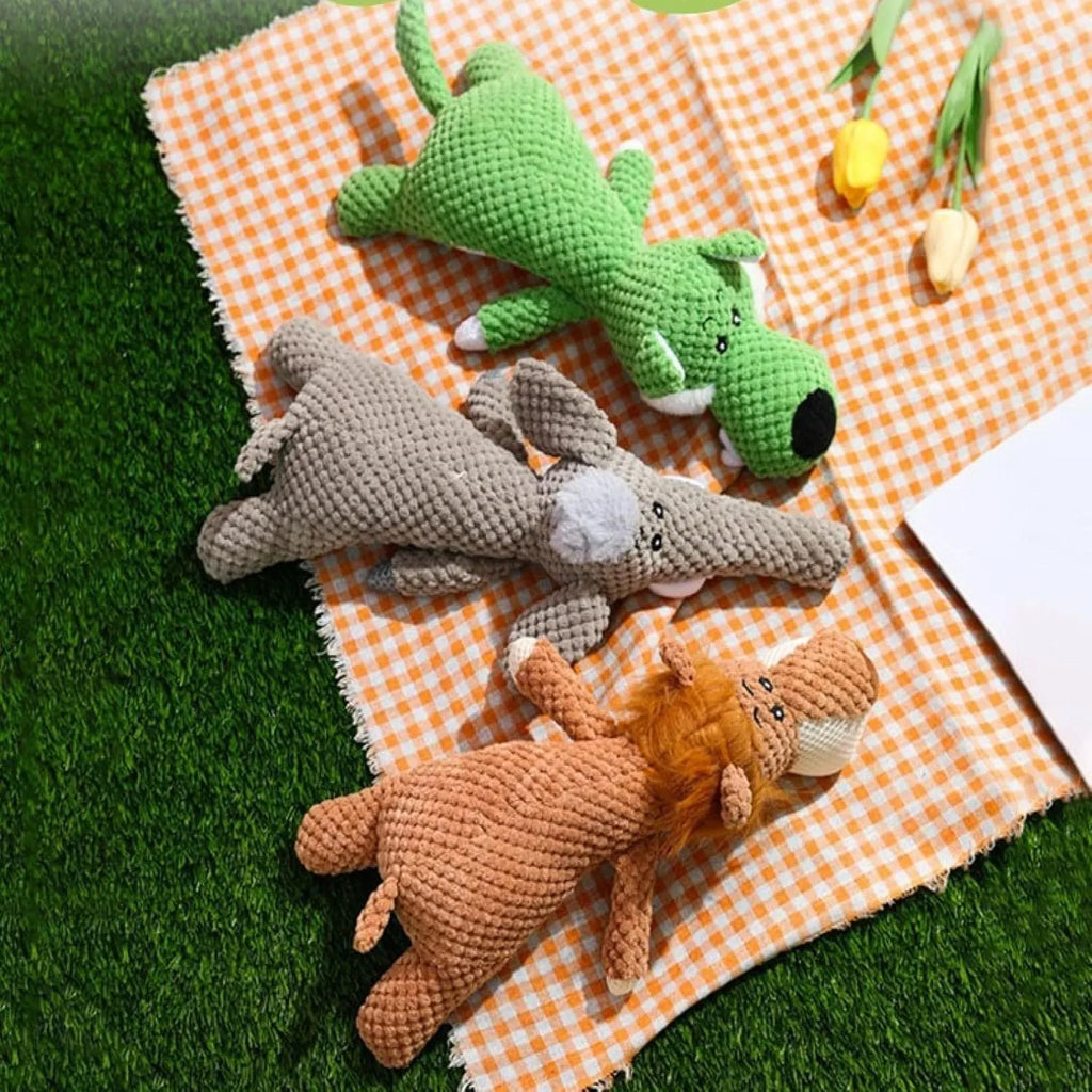 Corn-shaped plush dog chew toy with textured kernel design and squeaker