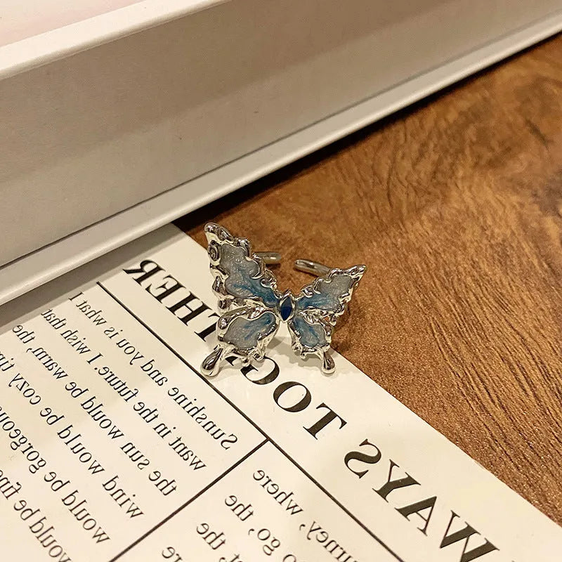 Creative Chinese butterfly women's copper ring with dripping oil treatment process in simple style.