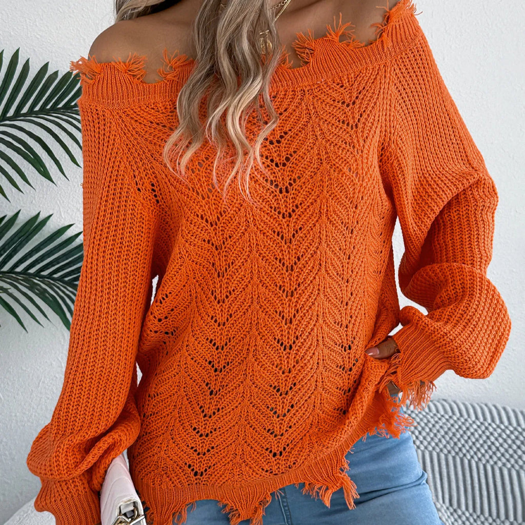 White women's hollow-out knit pullover sweater with long sleeves and an off-the-shoulder neckline.