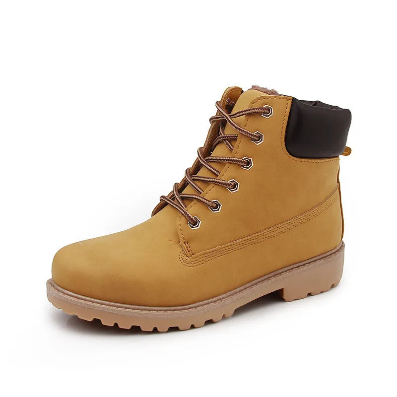Pink high-top Martin boots with velvet lining and flat sole, shown with front lace-up.
