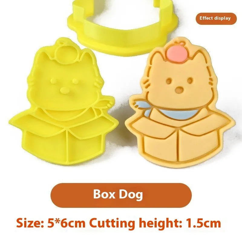 Plastic biscuit mould showing three-dimensional puppy head design with birthday hat for baking