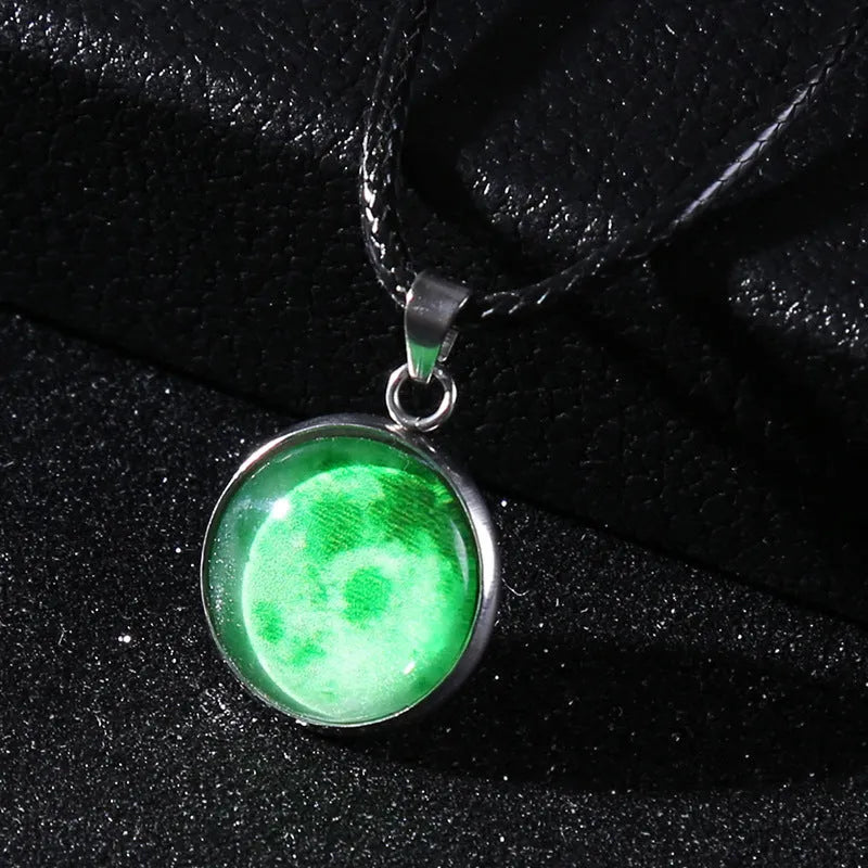 Alloy necklace with luminous glass pendant showing Christmas moon night sky and constellation design.