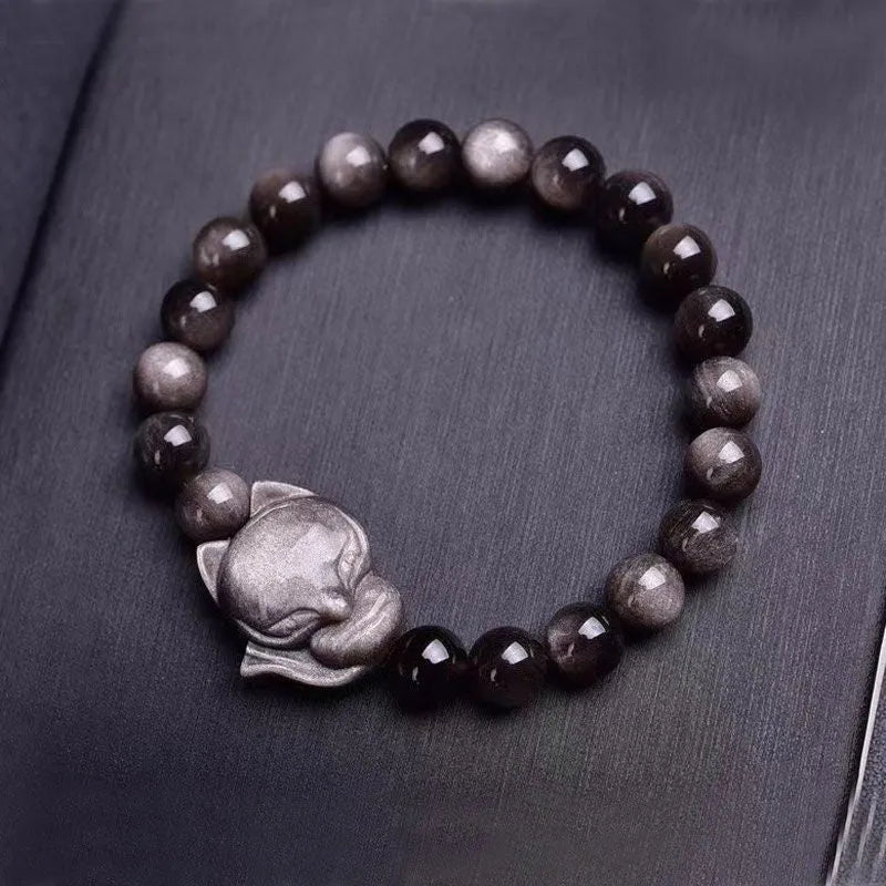 Obsidian fox bracelet with 8mm black beads and silver fox charm on adjustable black cord