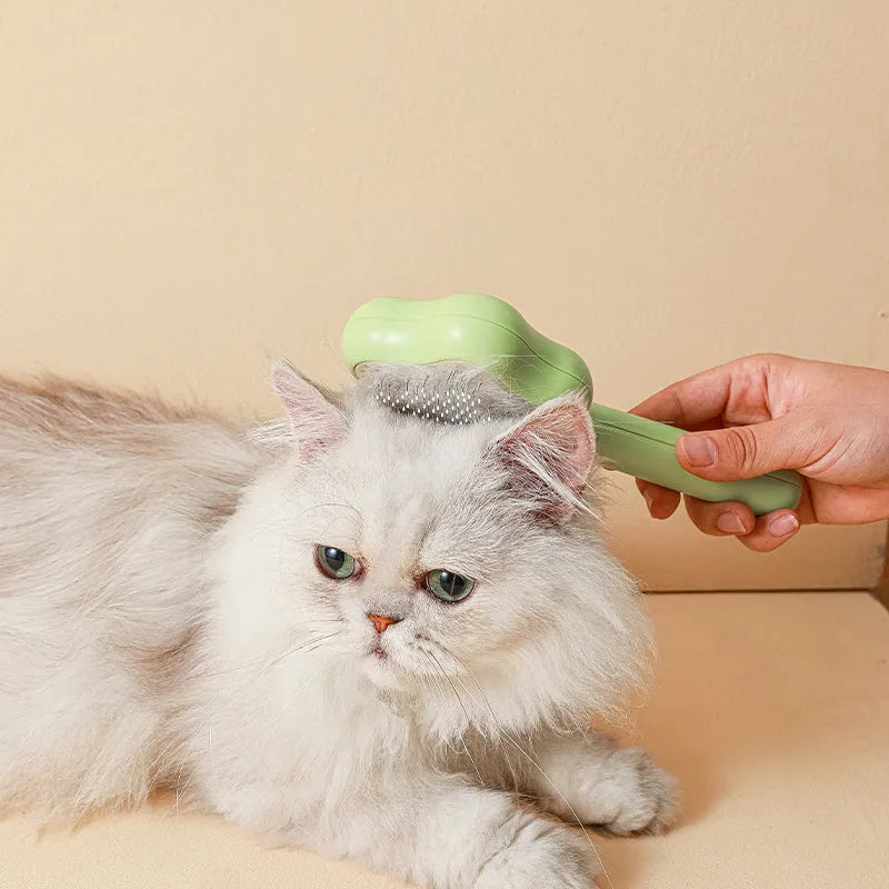 Green self-cleaning cat comb with stainless steel needle pins for pet grooming