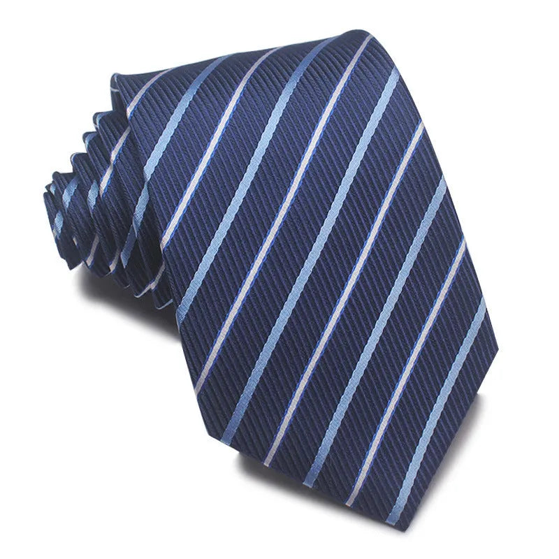 Close-up of a red, black, and blue striped men's formal tie with a textured Jacquard weave.