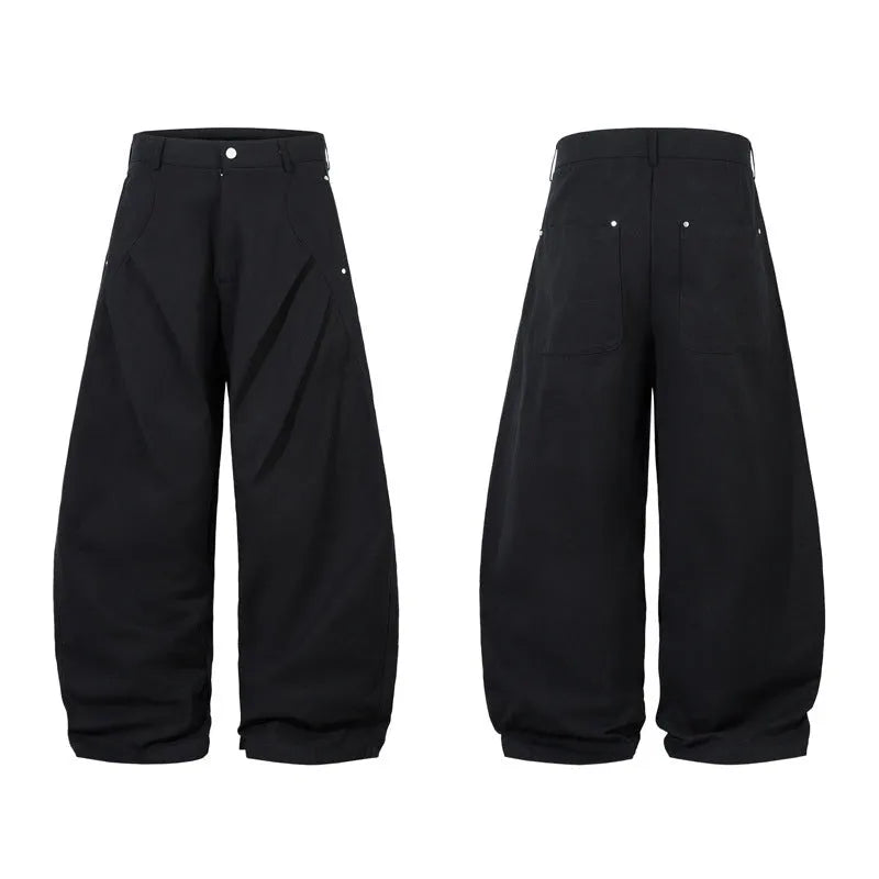 Men's black pleated casual trousers with machete pleats and loose wide-leg fit