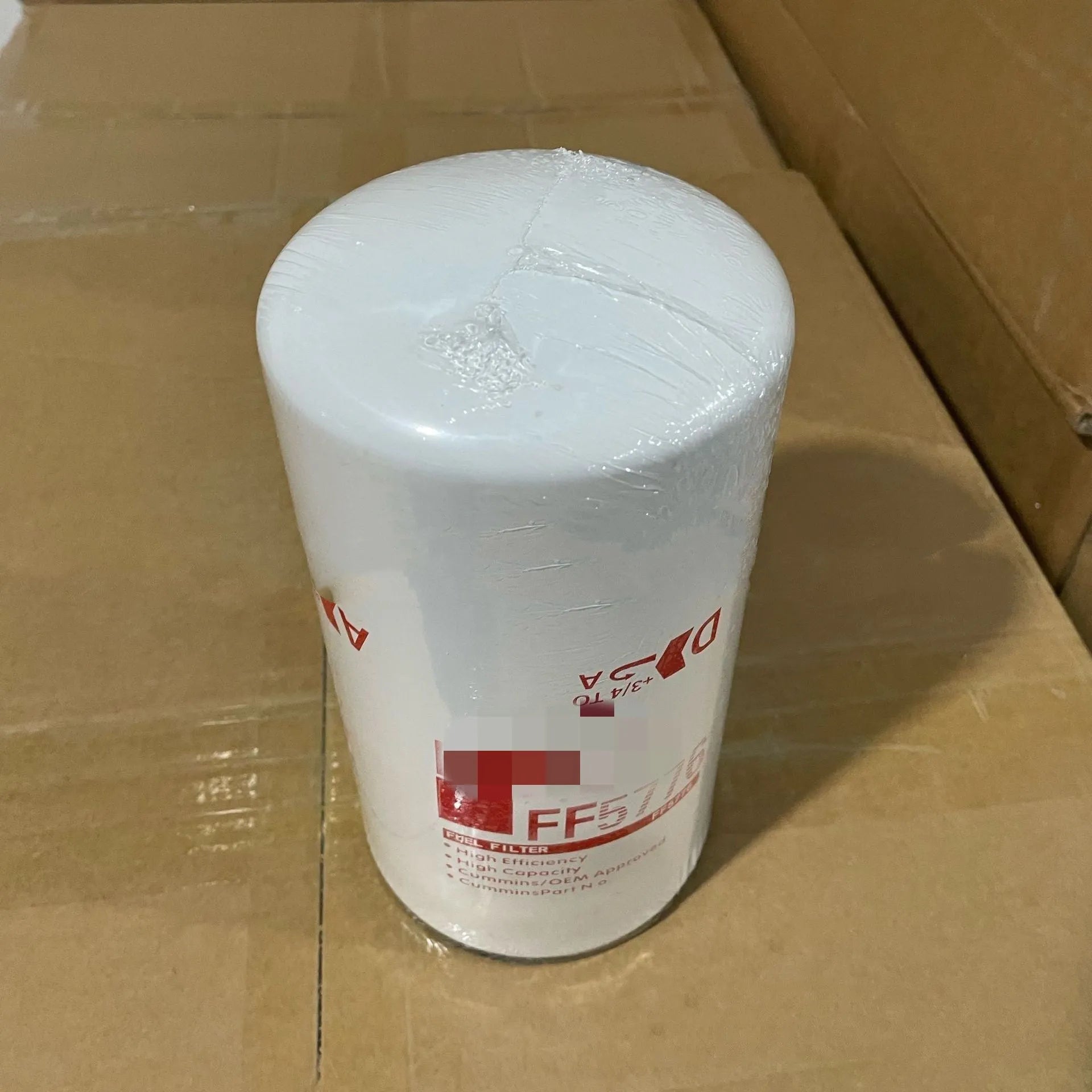 White metal diesel filter element FF5776 with 2mm inlet and outlet ports for automotive engine oil filtration