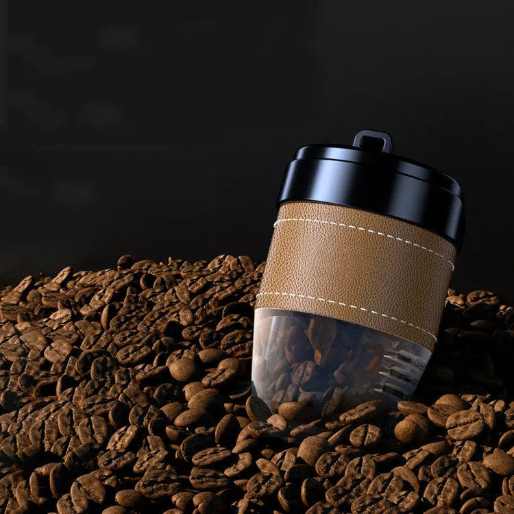 Coffee cup shaped plastic car air freshener in choice of five colours for vehicle interior use