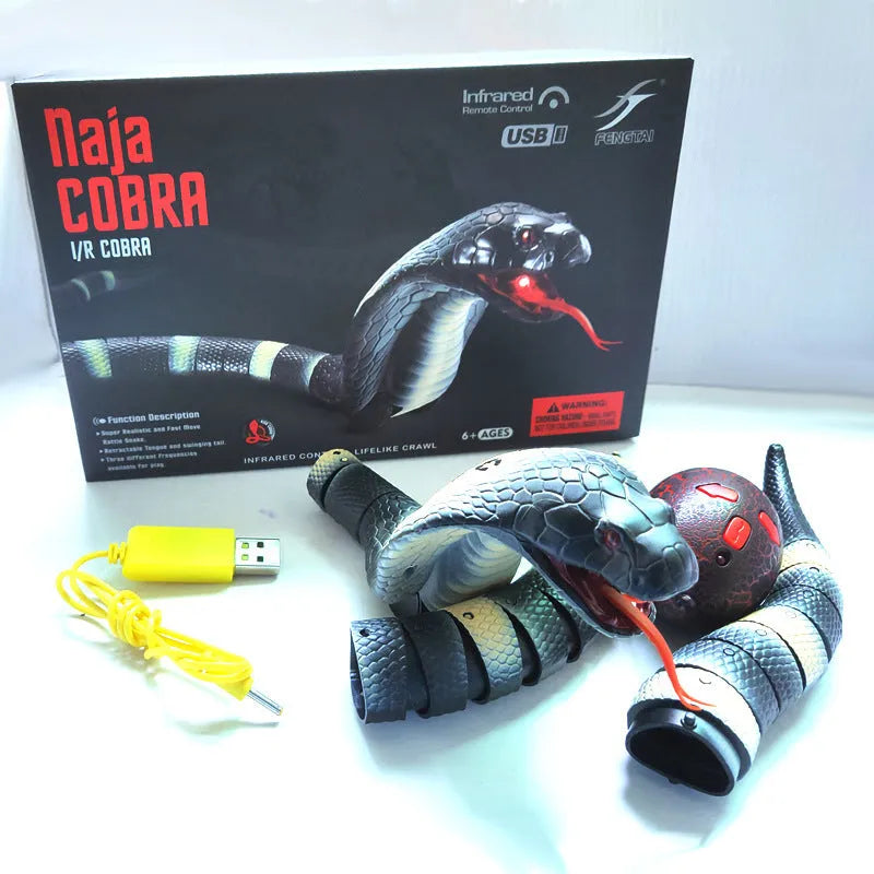 Automatic electronic snake cat toy with segmented plastic body on a floor.