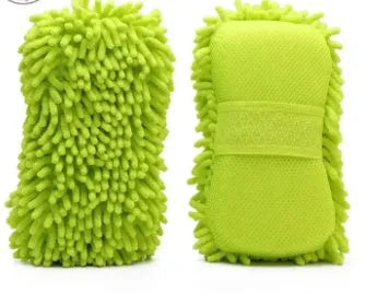 Silver green rectangular car wash sponge block on a clean surface