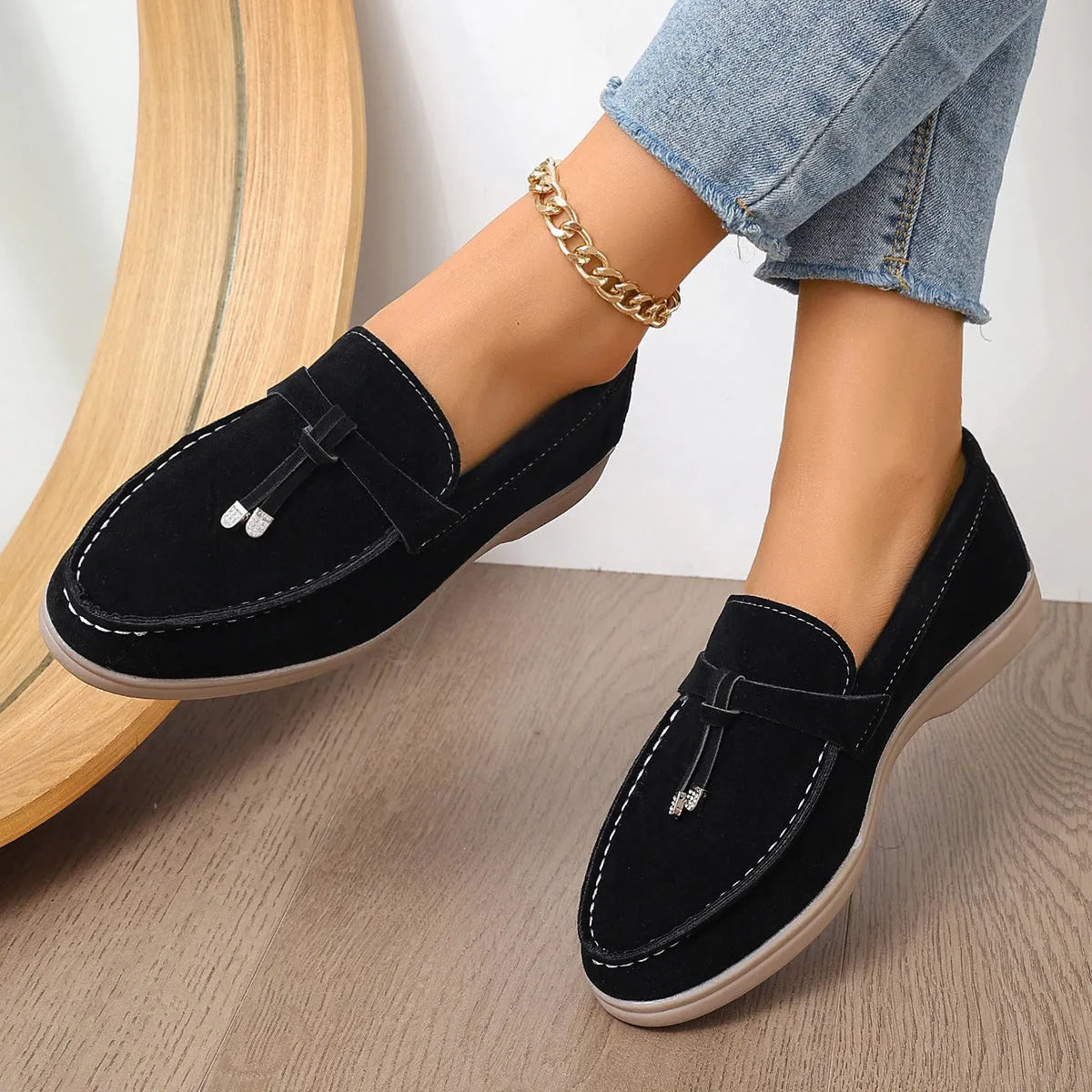 Solid colour canvas Gommino slip-on loafers with a round toe and platform heel on a rubber sole.