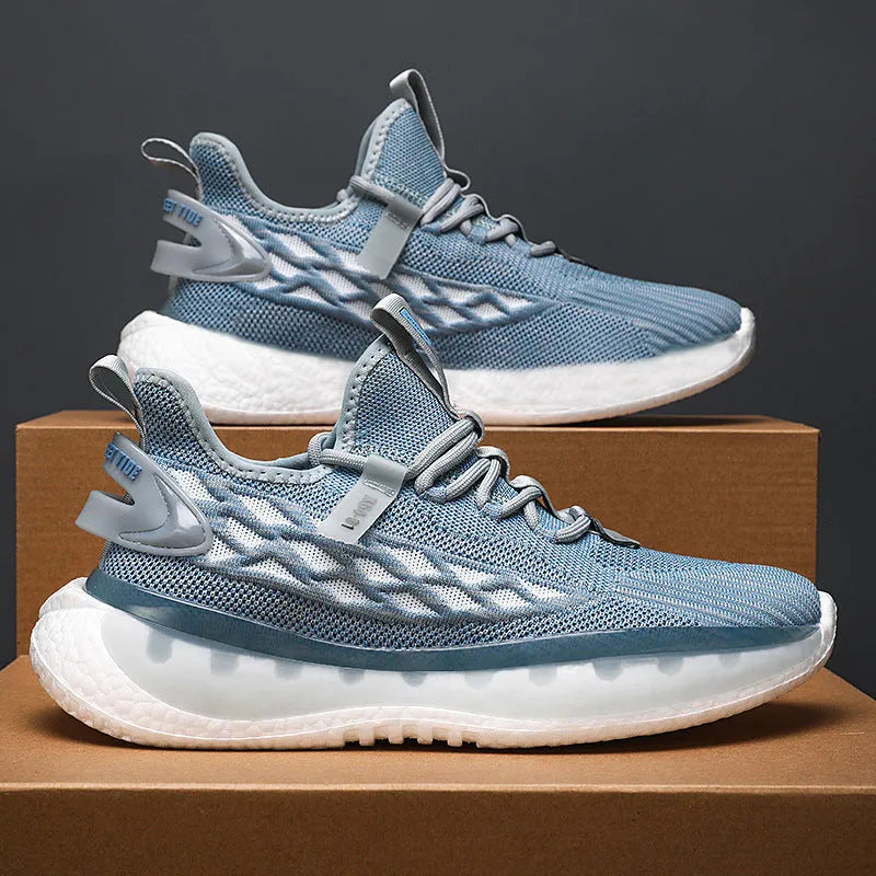 Men's white lace-up platform sneakers with mesh upper and flat rubber sole.