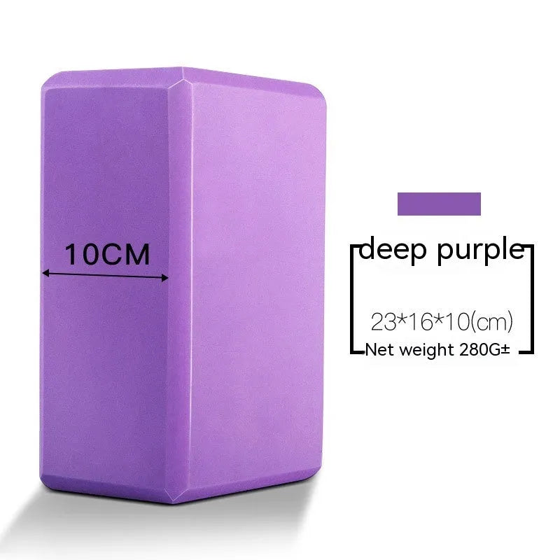High-density EVA yoga block in violet colour next to a pink block with a cartoon print design.