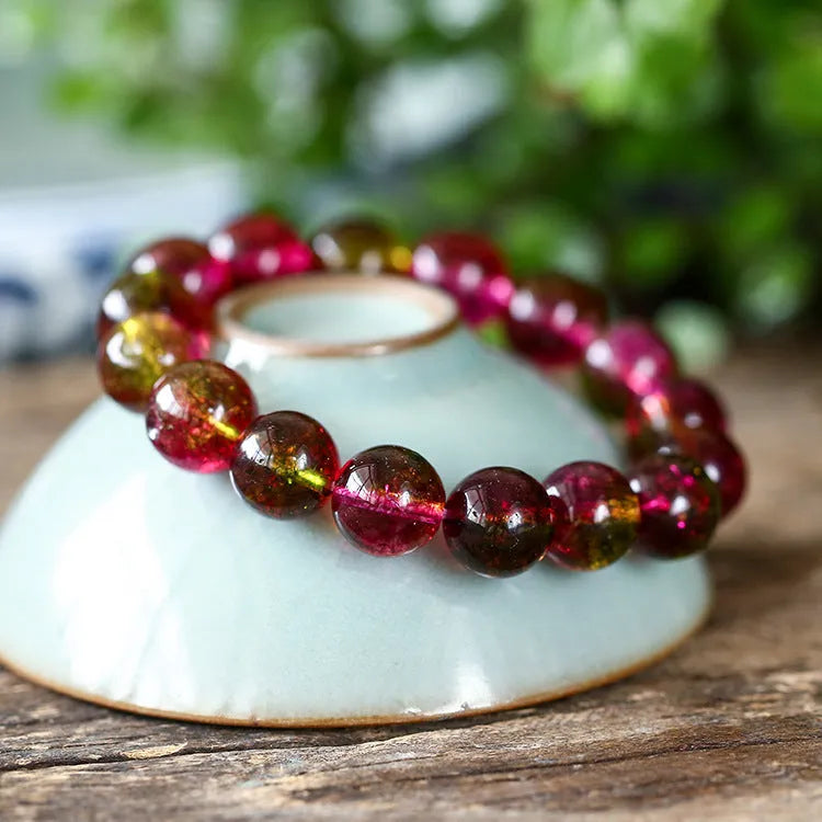 Women's watermelon crystal bracelet showing handcrafted beads in pastoral casual style