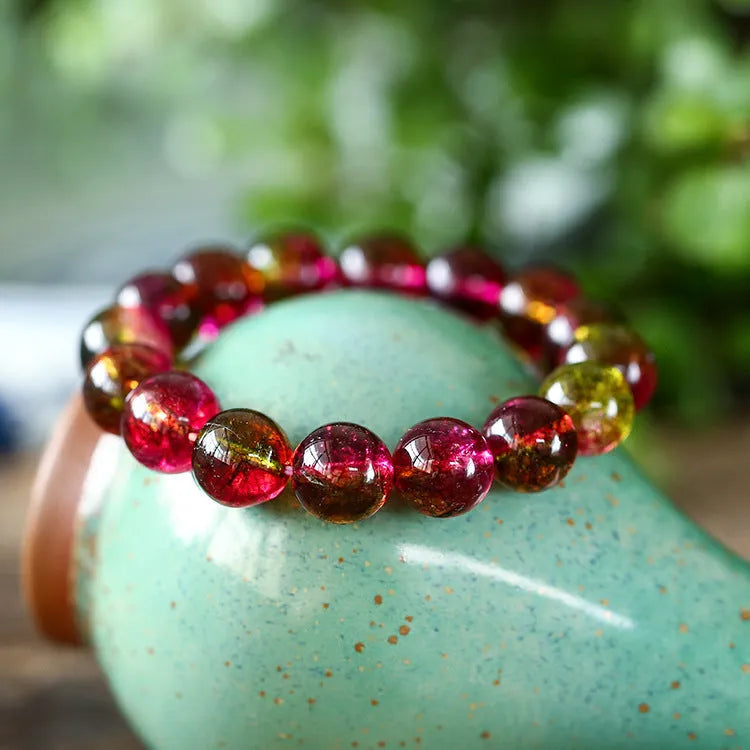 Women's watermelon crystal bracelet showing handcrafted beads in pastoral casual style