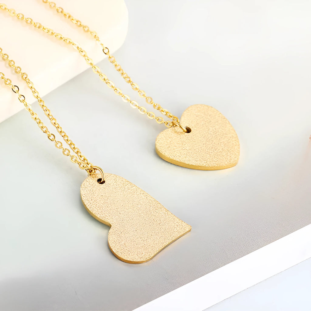 Silver geometric heart pendant necklace on a 45 cm titanium steel chain.
