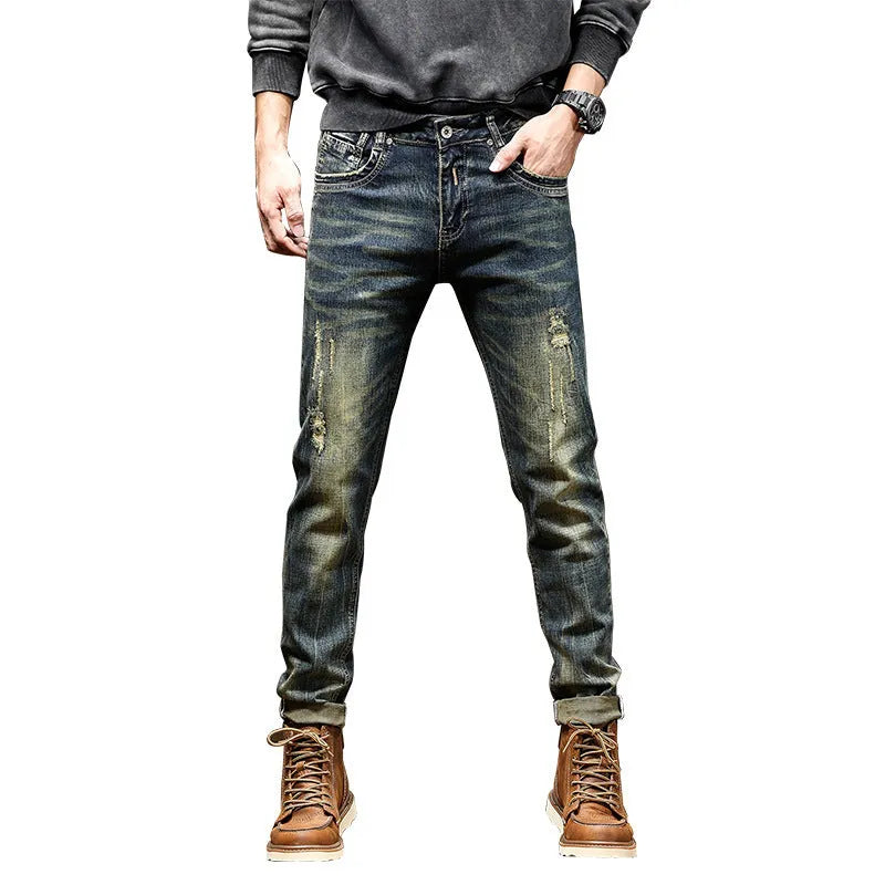Men's skinny jeans in retro colour with zip fly, showing stretch denim fabric and slim pencil pants cut