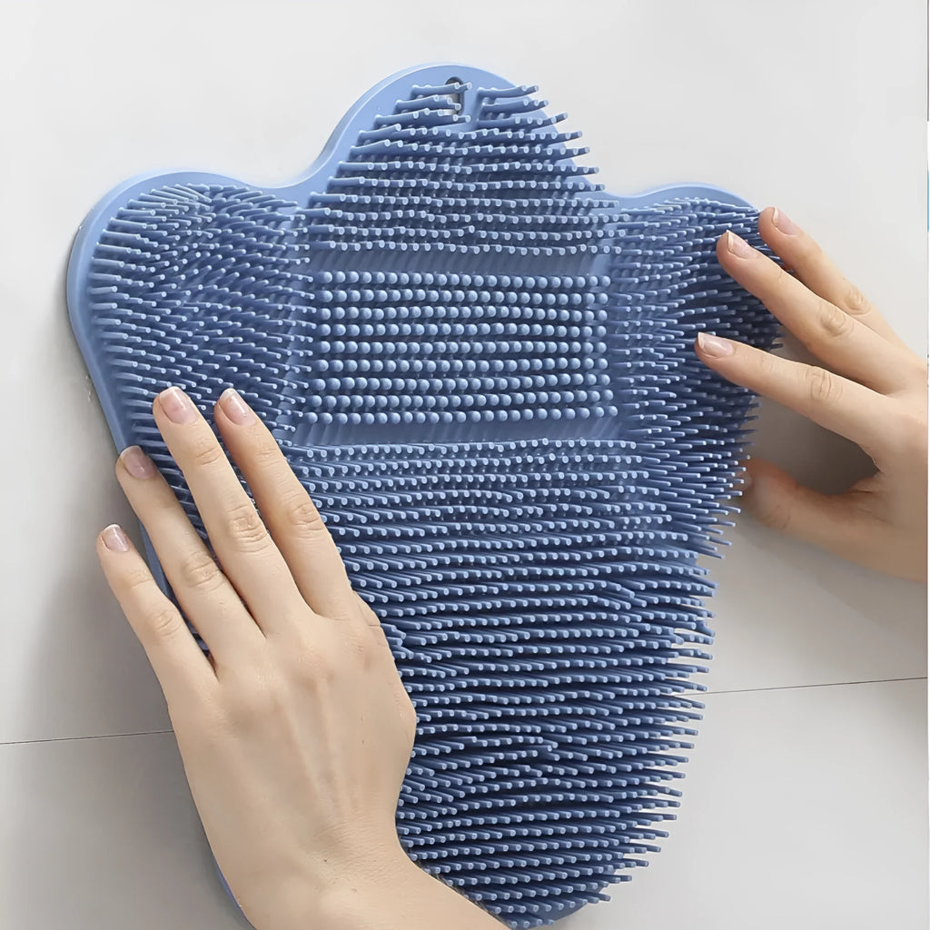 Blue silicone bath brush with curved handle for back scrubbing, measuring 31cm by 32cm