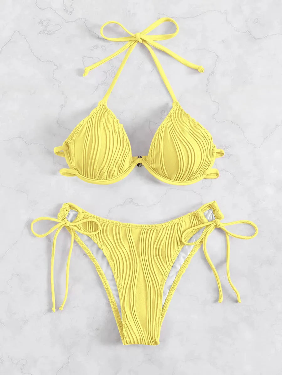 Women's apricot coloured split bikini swimsuit with steel wire bracket support.