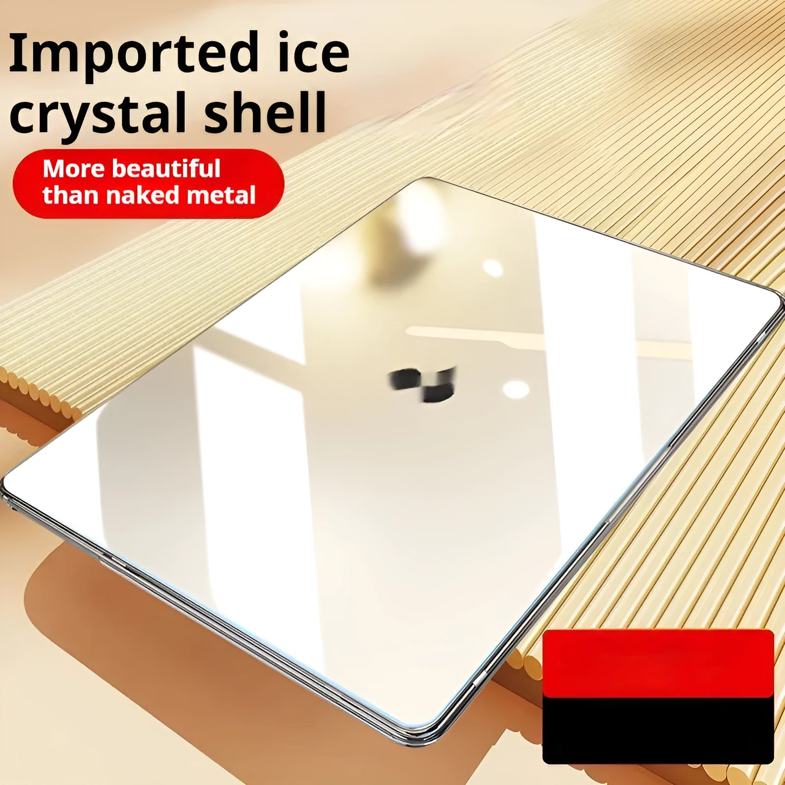 Transparent plastic hard shell protective case for a MacBook laptop on a table.