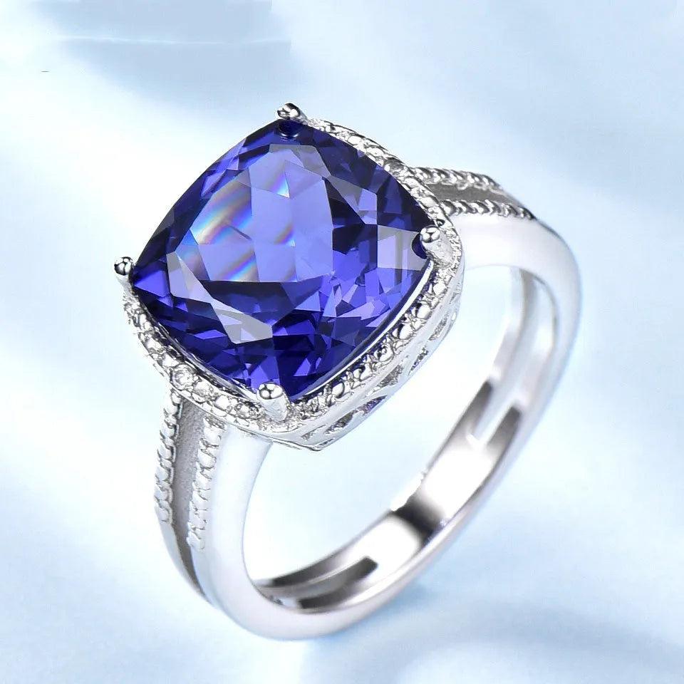 Women's sterling silver ring with a genuine blue tanzanite gemstone, shown in size 8.