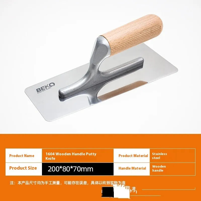 Three stainless steel putty scrapers with wooden handles in different sizes for decorative floor and wall application