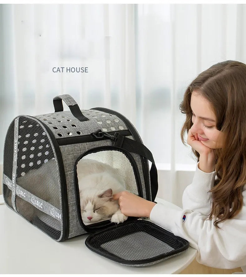 Portable one-shoulder pet bag for cat travel in blue Oxford cloth with anti-scratch cradle net