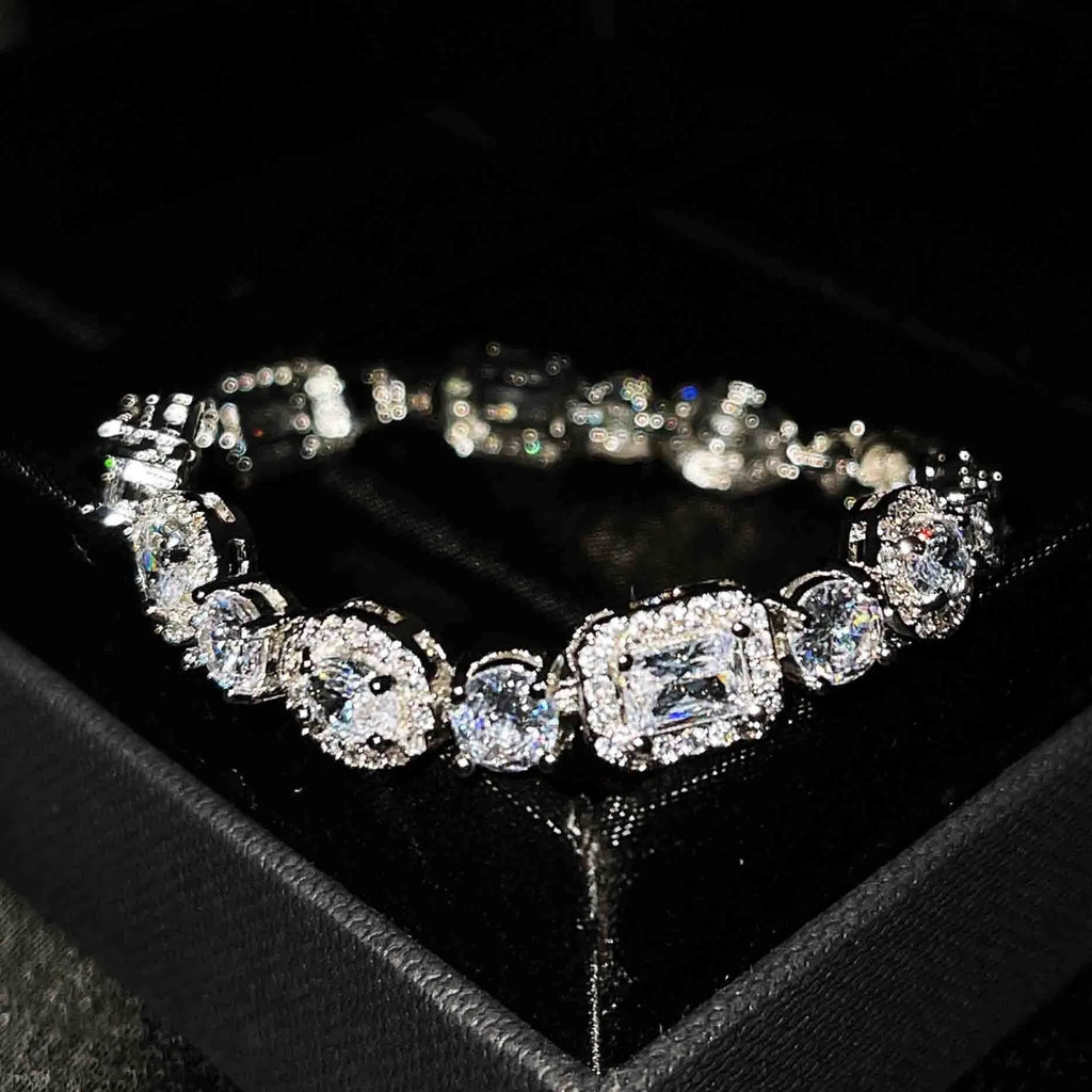 Women's geometric silver-plated bracelet with zircon stones showing adjustable and fixed length options