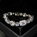 Women's geometric silver-plated bracelet with zircon stones showing adjustable and fixed length options