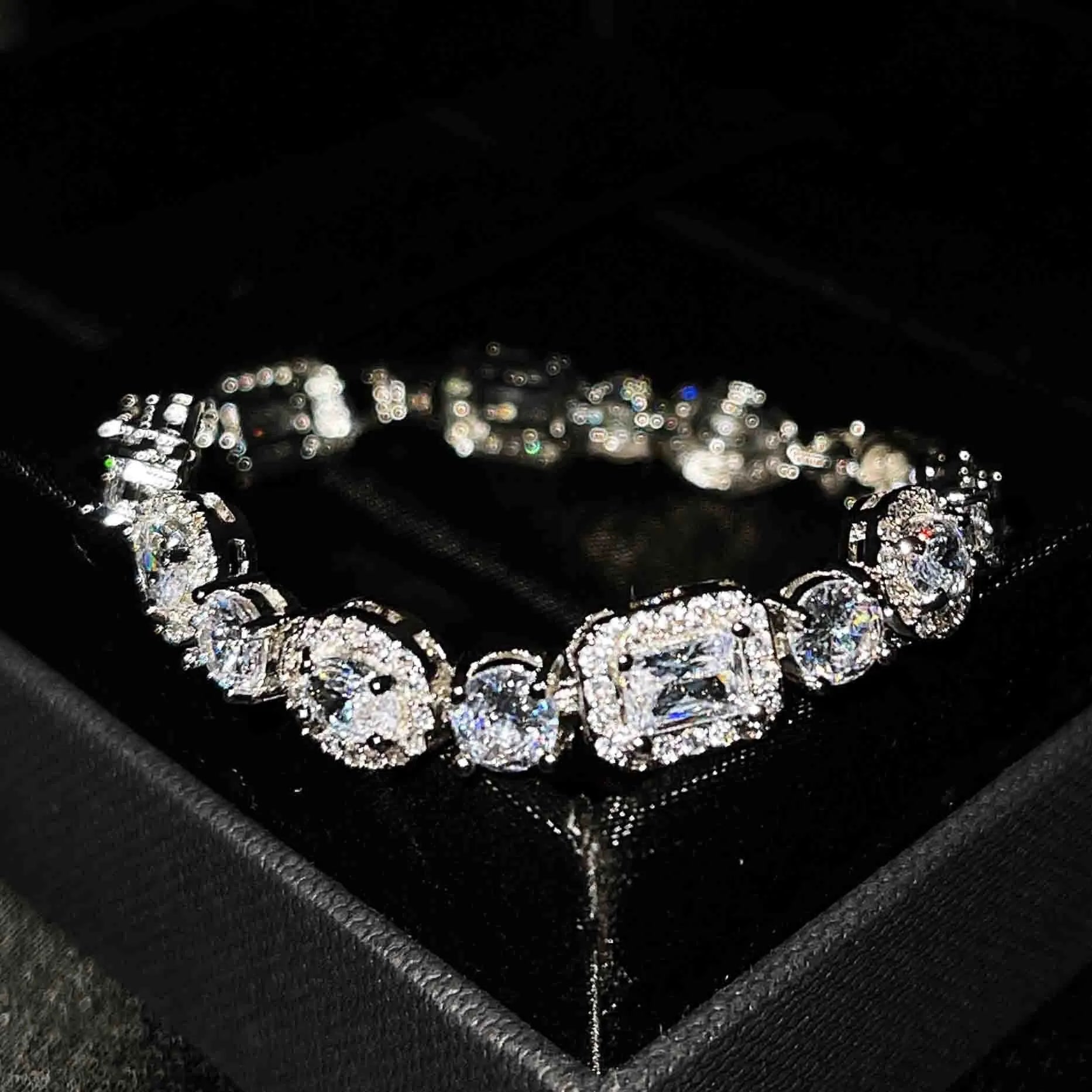 Women's geometric silver-plated bracelet with zircon stones showing adjustable and fixed length options