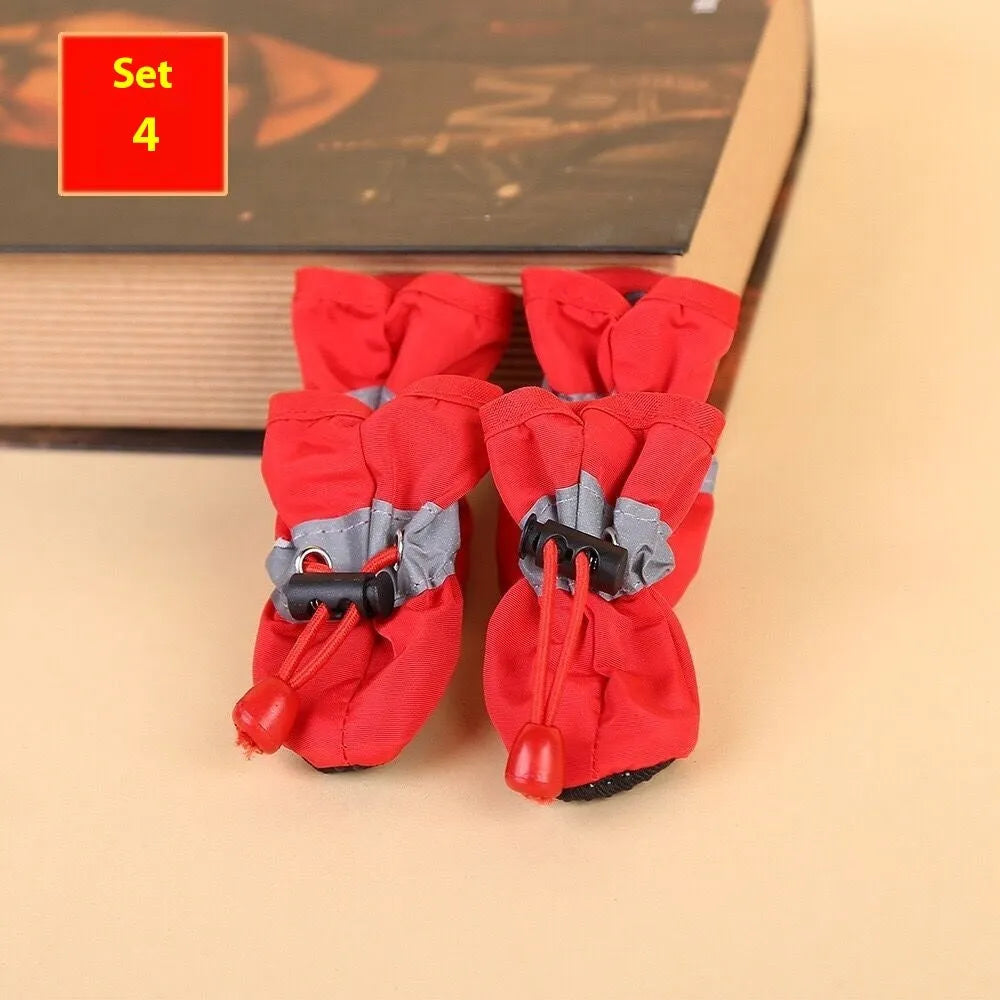 Soft sole cloth dog shoes showing multiple colour options including fleece-lined and monkey print designs