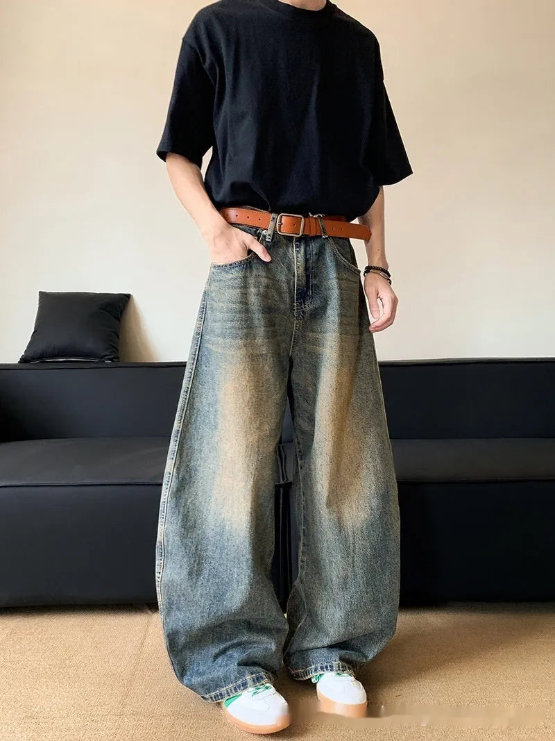 Men's retro blue distressed denim wide-leg jeans with a slimming fit and zip fly