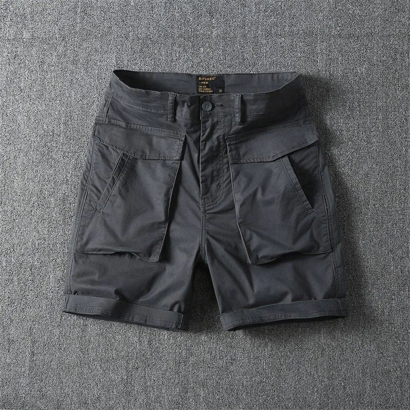 Men's stretch cotton cargo shorts in army green showing multiple pockets and straight-leg fit.