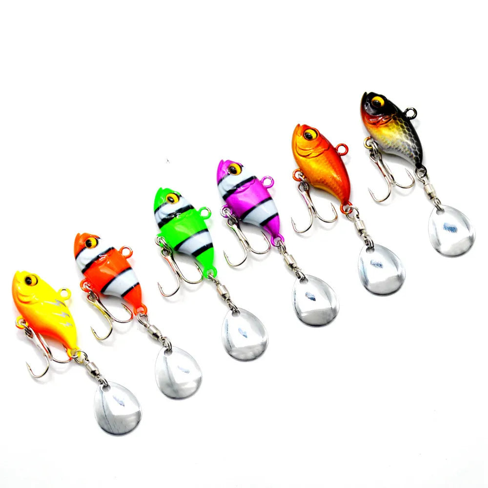 Metal sea fishing lure with rotating sequins in gold colour pattern