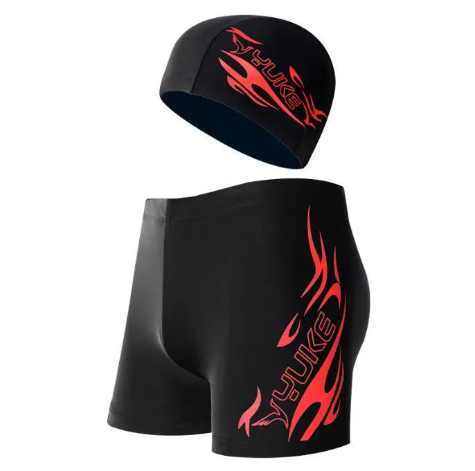 Men's plus size blue fire print swimming trunks and matching swim cap on black background.