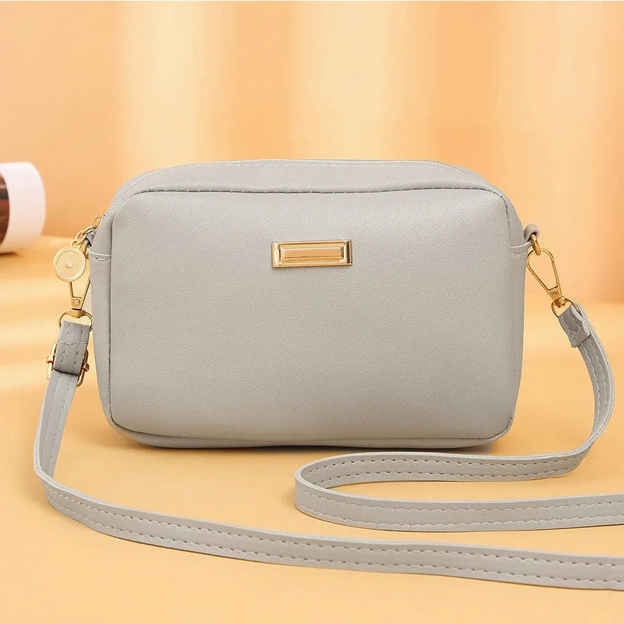 Women's soft PU shoulder bag with three-dimensional pocket in urban simplicity style
