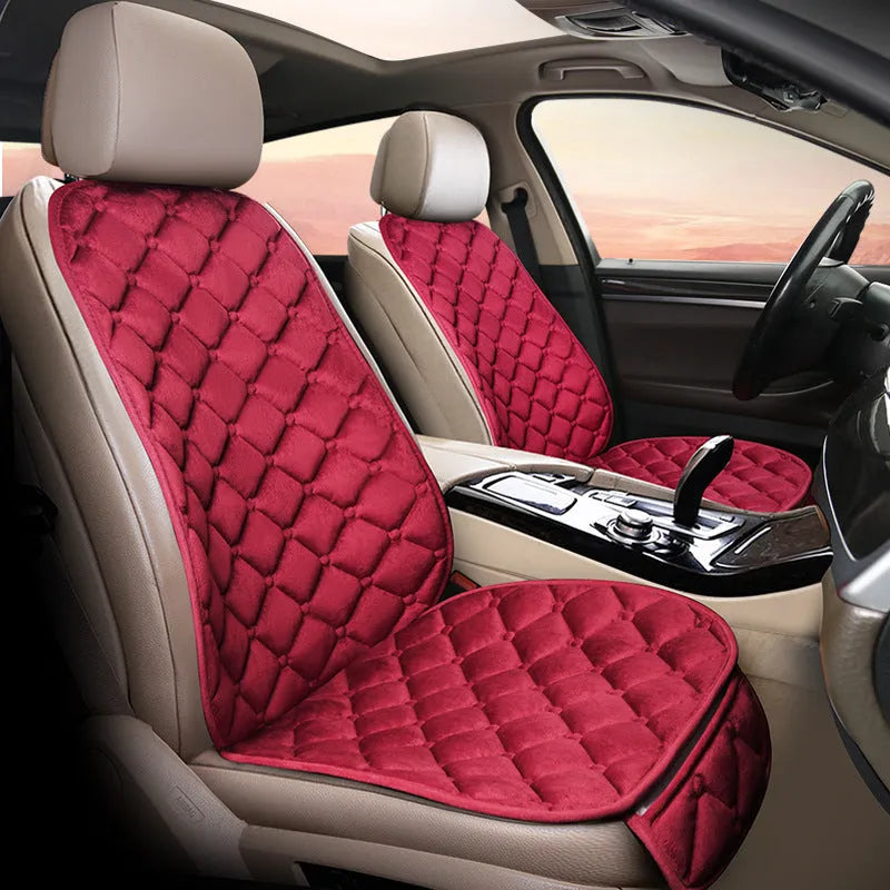 Ringer plush cotton car seat cushion shown in burgundy colour on a car seat.