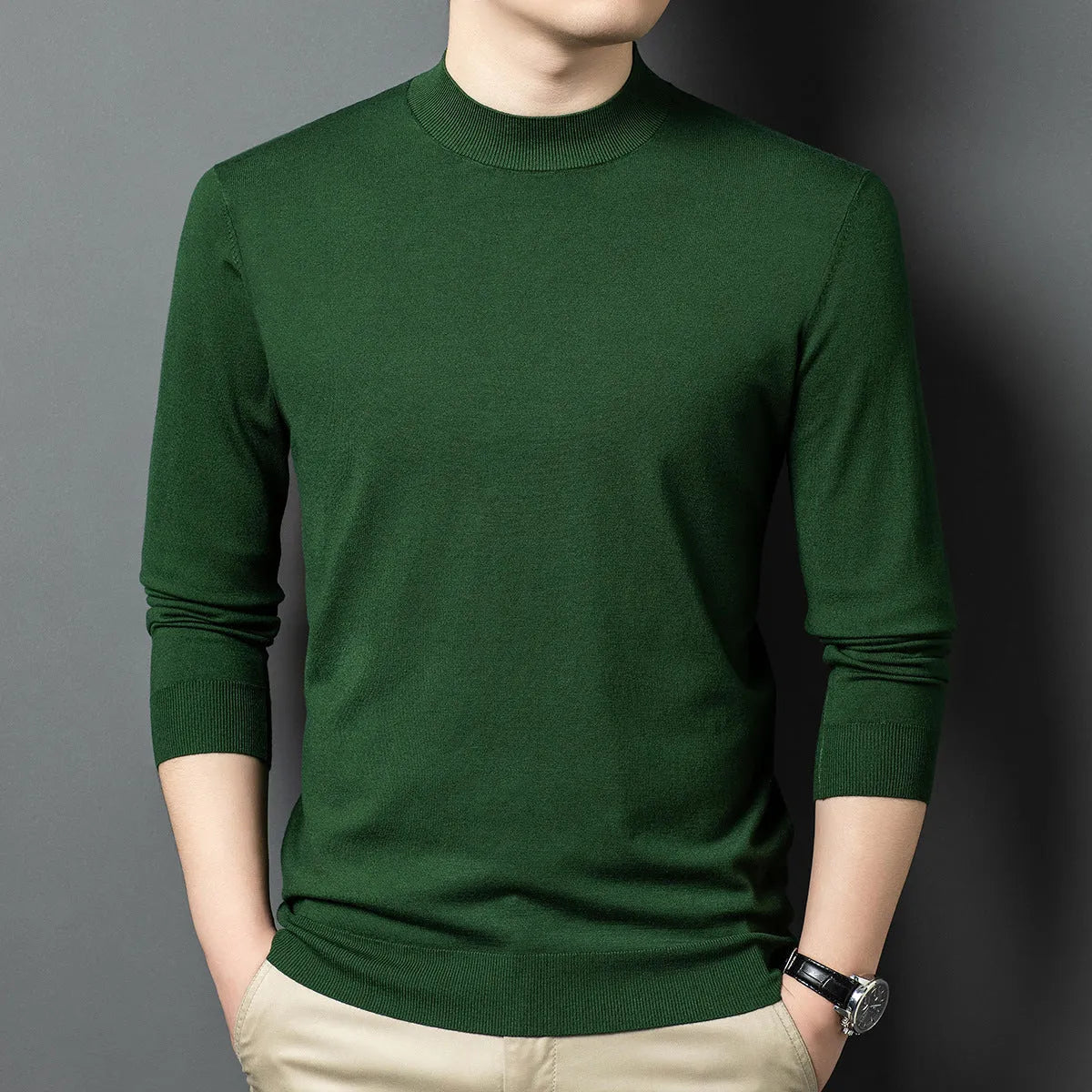 Men's round neck wool pullover sweater in a neutral colour with long sleeves, laid flat.
